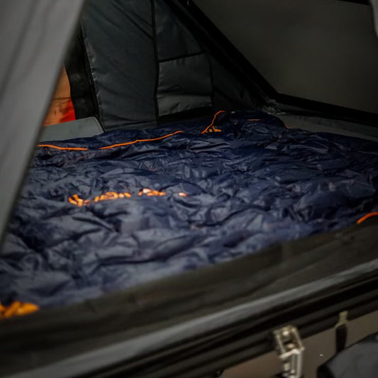 AreaBFE Tents for overlanding and camping packable goose down blanket.