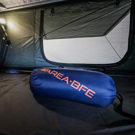 AreaBFE Tents for overlanding and camping packable goose down blanket.